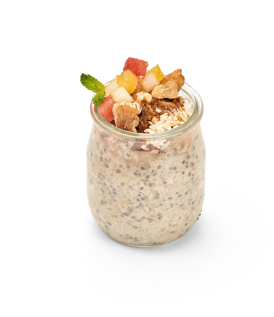 Blueberry chia pudding in a Overnight Oatmeal Jar- Cinnamon-Spiced with cinnamon-spiced nuts.