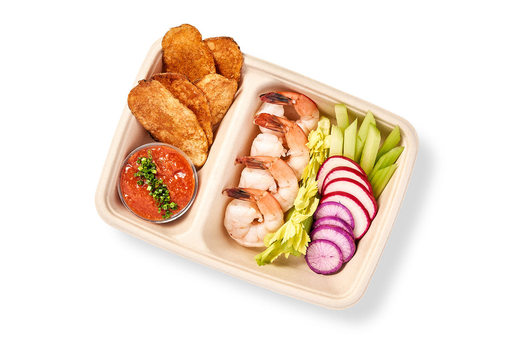 A Classic Shrimp Cocktail Snack Box with jumbo shrimp and chips.