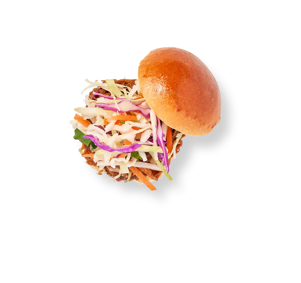 A BBQ Beef Brisket on Mini Brioche burger with chili lime slaw, all photographed on a white background.