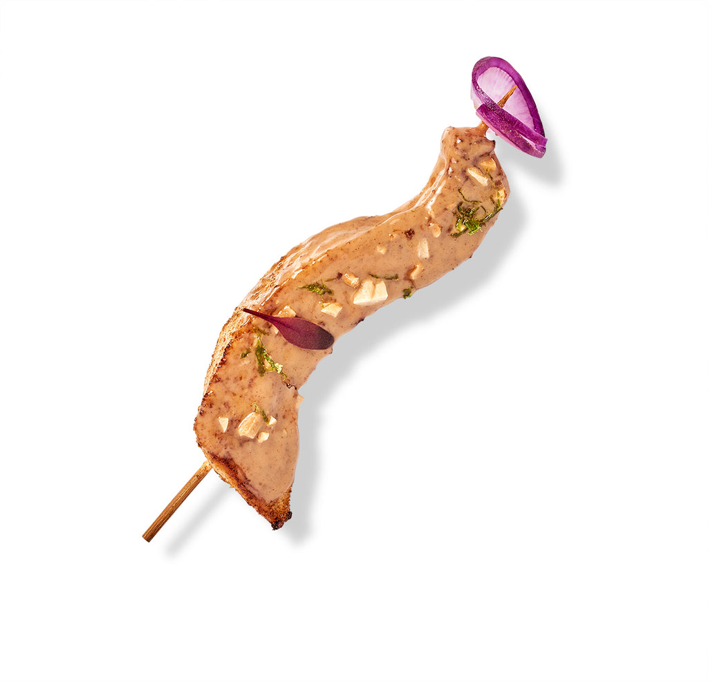 Succulent Grilled Chicken Satay served with a savory peanut dipping sauce.