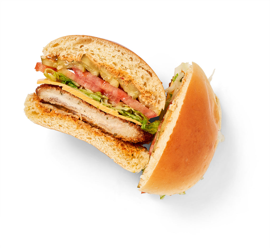 McDonald's Crispy Chicken Sandwich with Chipotle Aioli and Agave Slaw, showcased on a white background.