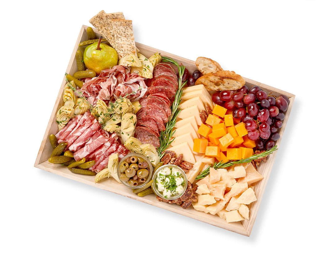 An exquisite selection of Antipasti and Cheese Mixed Platter, beautifully presented on a wooden tray.