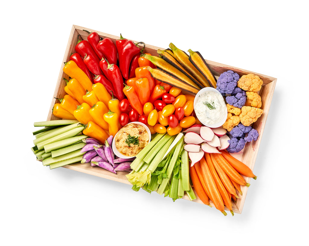 A Vegetable Crudité Platter with a variety of fresh vegetables in it.
